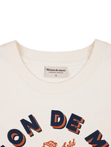 UNISEX オーバーフィットサーフブーブエンボスロゴショートスリーブT　クリーム (FCE2TS405M)