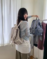 ムーキンドットバックルポケットバックパック