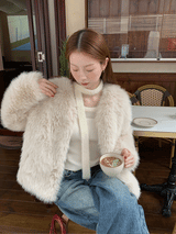 V-neck quilted ivory fur jacket