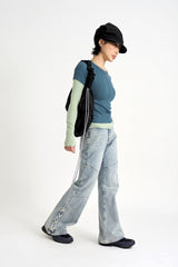 Sage cross lace denim pants