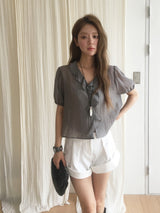 Cascade ruffle blouse