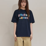 MELLOW DREAM Check Letter Half T-shirt