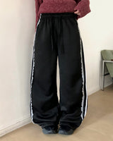 トゥオンフリースレーストラックスウェットパンツ