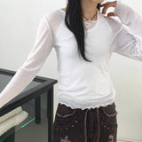 Nowell ハートカッティングシースルーテンセルウェーブUネック長袖Tシャツ