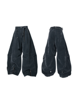 RELABEL Spatial Relations (Velvet Flowers) Muscular Line Segmentation Flocked Curved Blade Silhouette Dual-Form Denim Trousers