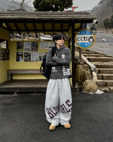 レノンレタリングワイドスウェットパンツ