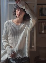 Reverse damage V-neck knitwear
