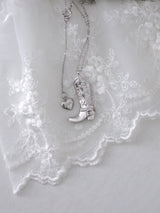 Click heart boot necklace