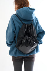 Metallic panel drawstring backpack