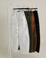 Kuro banding snap pocket wide fit washed pants