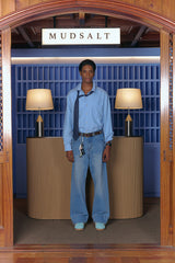 WASHING CURVED WIDE DENIM PANTS LIGHT BLUE