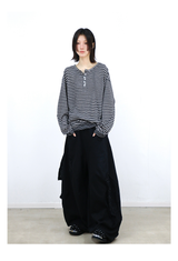 RELABEL (Vision) Lightweight, velvety-textured striped patchwork long-sleeved T-shirt with a wet-look finish, studded details and a scoop neck