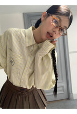 a forsythia striped loose-fit shirt