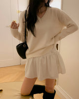 Nuen Vネックニット