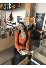 オレンジディープVネックツウィステッドロングスリーブニットウェア