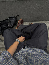Node single-pleat raw denim jeans