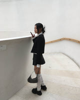 Low check button skirt