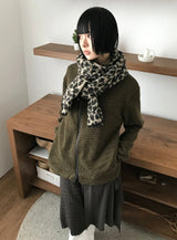 DIAGONAL HIGH-NECK ZIP-UP