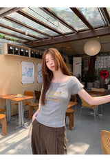 イエロークリームオフショルダーショートスリーブニットTシャツ