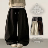 Rogle washed-out banding side pin tuck cotton wide pants