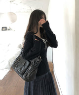 ディブロングスリムケーブルVネックニット