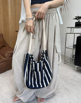 Penan striped shoulder bag