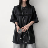 ポーチエンブロイダリースリットボクシーフィットショートスリーブTシャツ