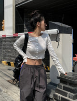 Leaf punching snap button crop cardigan