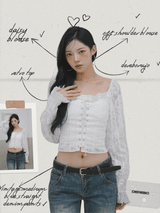 daisy punching strap frill blouse