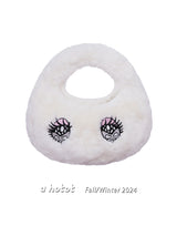 ”crying eyes“ embroidered fur bag