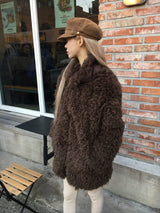 カーリーファー素材のダッフルコート