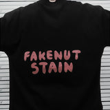 フェイクナッツ ステイン メイド イン アスタリスク ブラック ボクシー オーバーサイズ Tシャツ