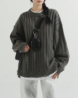 Bold ribbed damage over knit