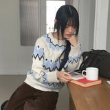 ウーケンノルディックハートツイストラウンドニット