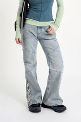 Sage cross lace denim pants