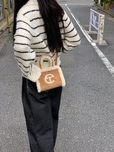 Clang wool striped cardigan