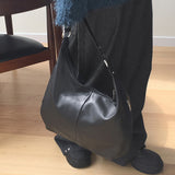 konen incision leather big shoulder bag