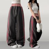 Vito coloring nylon three-line track line wide pants