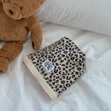 classic pouch_corduroy leopard ivory