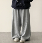 イアンフロントダイアゴナルインシジョンヘムストリングワイドパンツ