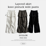 Log banding layered pocket skirt pants