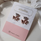 [CHUU Piercing] Heart Crystal and Ribbon Piercing - Rosegold