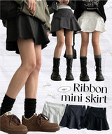 Torom Back Banded Ribbon Slit Flare Mini Skirt