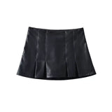 Leather vest pleated skirt set
