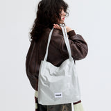 GLOSSY SHOULDER BAG