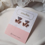 [CHUU Piercing] Heart Crystal and Ribbon Piercing - Rosegold