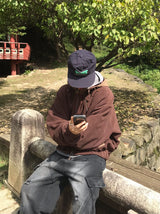 リブフードハードジップアップニット