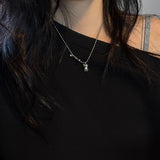 tooth piercing necklace