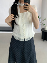 Sovy check flare midi skirt