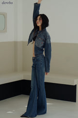 Round medium blue zip-up denim jacket